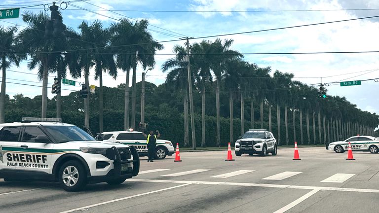 Police vehicles are pictured near Trump International Golf Club after gunshots were reported in the vicinity of Republican presidential candidate former President Donald Trump. Pic: AP